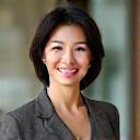 Portrait of Dr. Lisa Chen, a smiling Asian woman in professional attire.